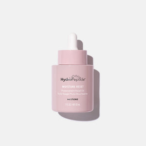 Moisture Reset | HydroPeptide phytonutrient facial oil in a pink dropper bottle designed for skincare hydration and restoration.