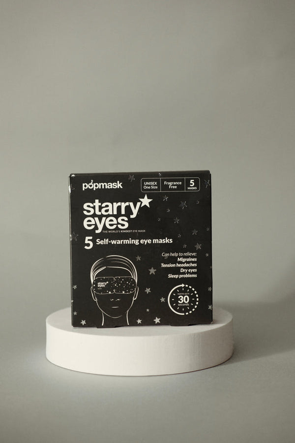 Black packaging of Starry Eyes Warming Eye Mask - Single | Popmask with white text and star graphics, highlighting five self-warming masks designed for skincare and wellness.