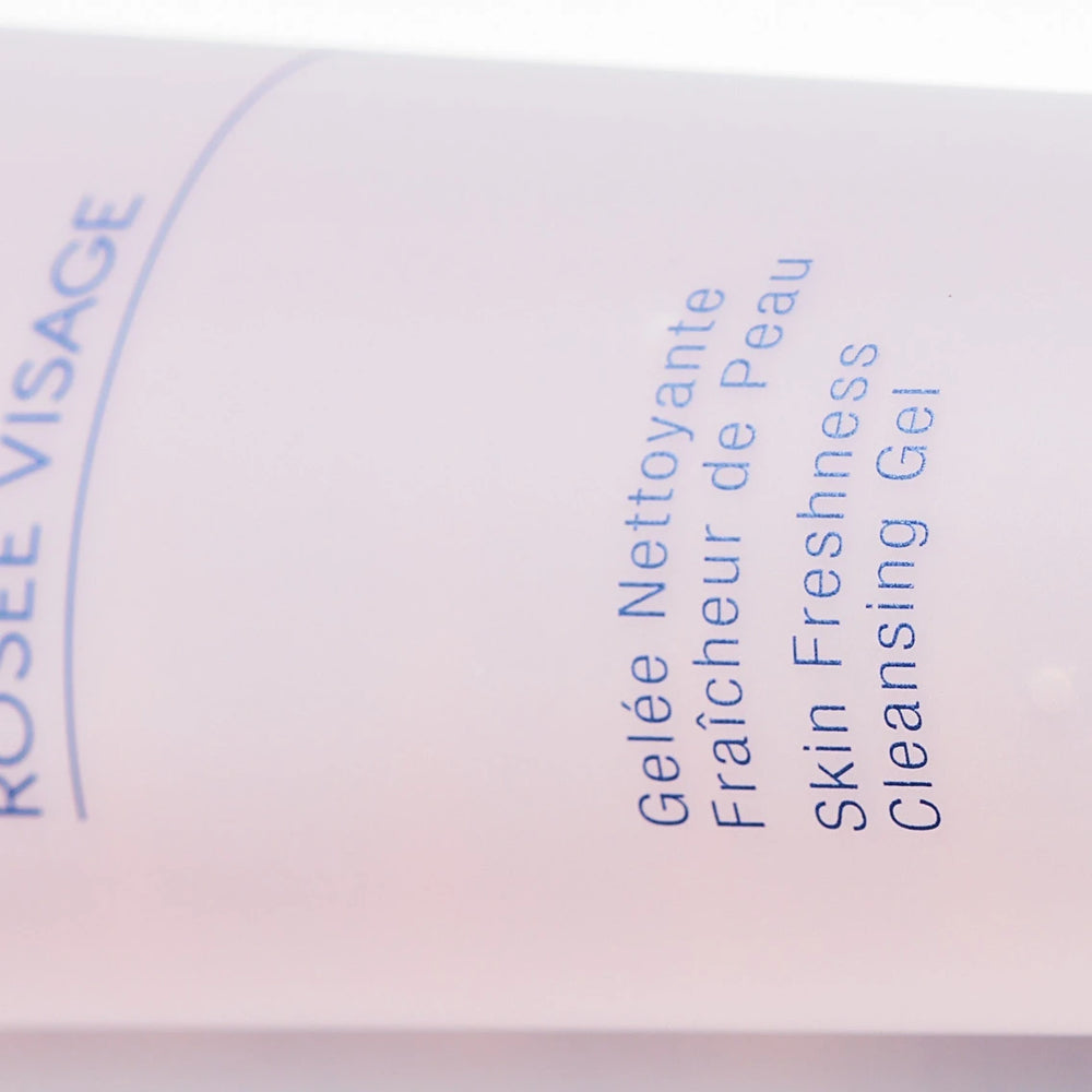 Phytomer Rosée Visage Skin Freshness Cleansing Gel in a pink tube designed for skincare, ideal for refreshing and cleansing the skin with a gentle formula.