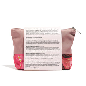 Back view of a pink floral makeup bag containing the Drama & Shade Mini Mascara Set | Chella with product ingredient details printed on the attached label.