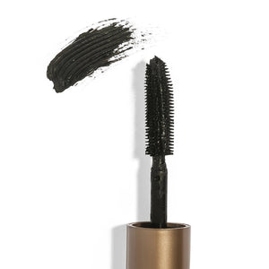 Close-up of a black mascara wand with a stroke of mascara above it, showcasing the texture and color for the Drama & Shade Mini Mascara Set | Chella.