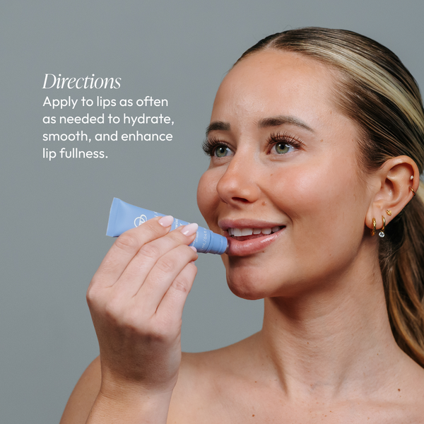 Woman applying Lip Renewing Hydrator - Vanilla Mint | Circadia lip treatment, demonstrating hydration and smoothing for enhanced lip fullness in a skincare routine.