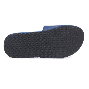 Black textured sole of a Spa/Shower Slide | Feelgoodz with blue upper strap, designed for comfort and slip resistance in wet environments.