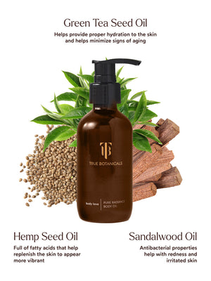 Bottle of Pure Radiance Body Oil | True Botanicals surrounded by green tea leaves, hemp seeds, and sandalwood pieces, highlighting key hydrating and soothing ingredients for skincare.
