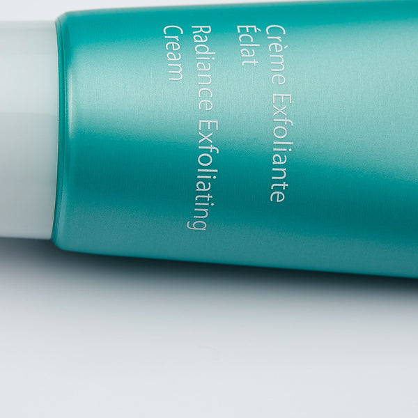 Close-up of the teal tube of Cyfolia Organic - Radiance Exfoliating Cream | Phytomer skincare product with visible product name text on the packaging.