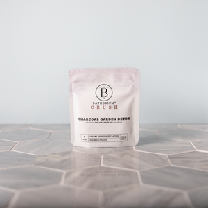 Charcoal Garden Detox Crush | Bathorium in a standing pouch on a tiled surface, showcasing body care skincare product designed for detox and wellness.