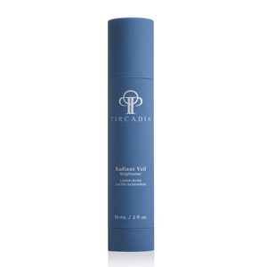 Blue cylindrical skincare bottle with white text displaying Radiant Veil Brightener (formerly White Veil Brightener) | Circadia, emphasizing a clean and elegant design for wellness and body care.