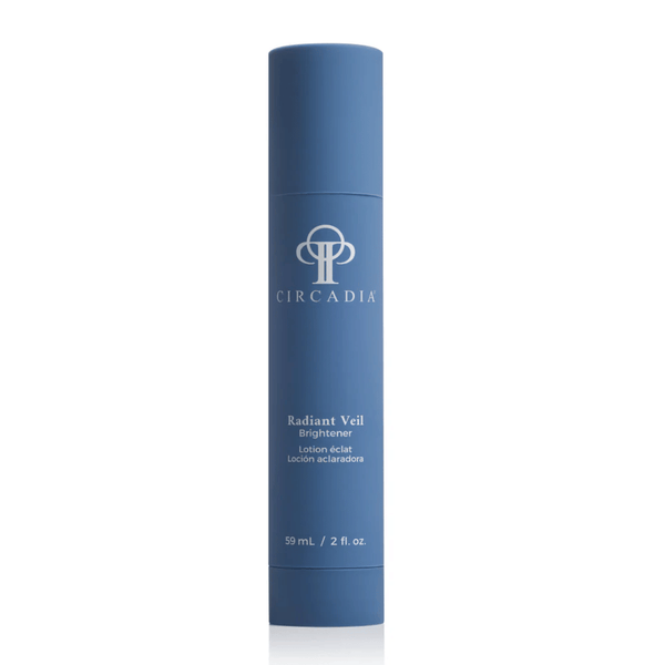 Blue cylindrical skincare bottle with white text displaying Radiant Veil Brightener (formerly White Veil Brightener) | Circadia, emphasizing a clean and elegant design for wellness and body care.