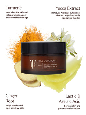 Jar of Ginger Turmeric Cleansing Balm | True Botanicals surrounded by turmeric powder, ginger root slices, yucca flowers, and a smear of cleansing balm, highlighting key skincare ingredients.