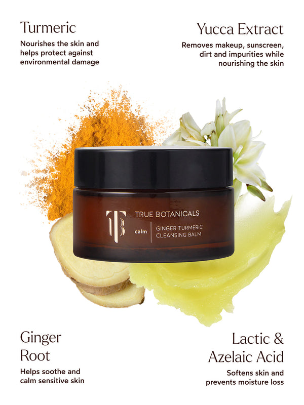 Jar of Ginger Turmeric Cleansing Balm | True Botanicals surrounded by turmeric powder, ginger root slices, yucca flowers, and a smear of cleansing balm, highlighting key skincare ingredients.