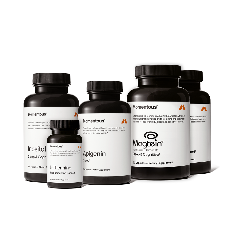 Collection of five dietary supplement bottles labeled with sleep and cognitive support ingredients displayed together as the Complete Sleep Stack for wellness and recovery.