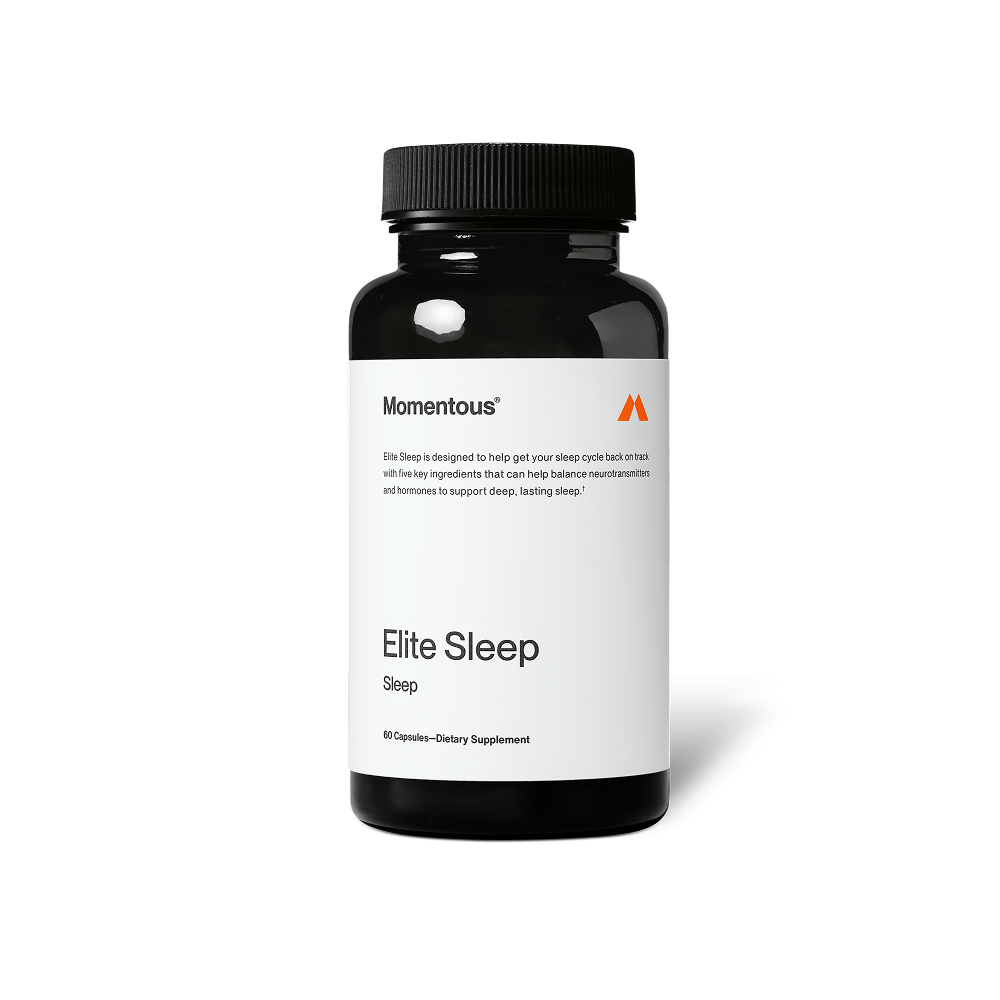 A black bottle with a white label for Elite Sleep dietary supplement by Momentous, designed to support deep, lasting sleep through balanced neurotransmitters and hormones.