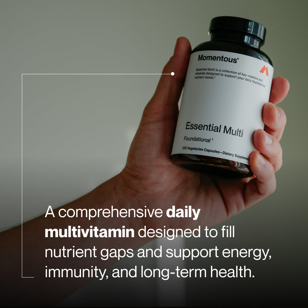 Black bottle of Multivitamin dietary supplement with a white label displaying essential vitamins and minerals for daily wellness support