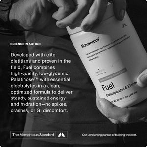 Close-up of a person holding a white bottle labeled Fuel, a carbohydrate and electrolyte formula designed to deliver steady, sustained energy and hydration without spikes or discomfort.