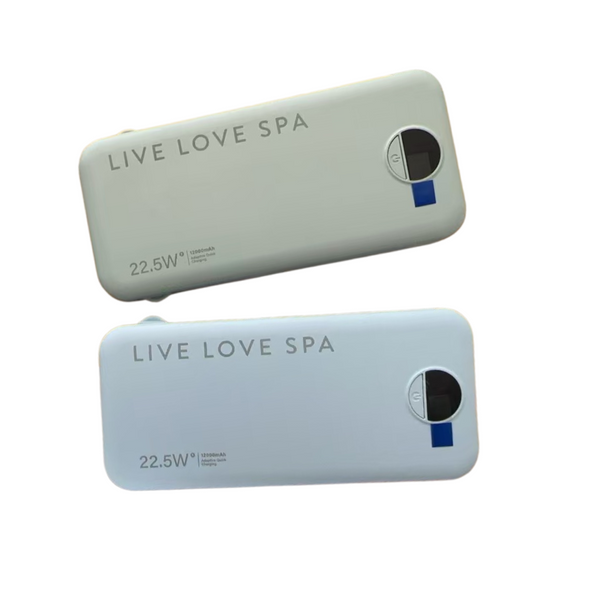 Two sleek rectangular portable chargers in soft beige and light blue colors branded with Live Love Spa, featuring 22.5W fast charging capability labeled Portable Charger Fast Charging Power Bank | Live Love Spa.