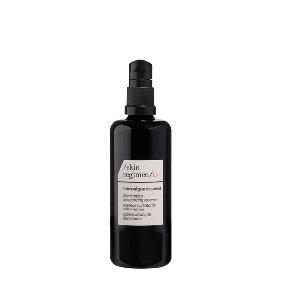 Black skincare bottle with a pump dispenser labeled Microalgae Essence | /skin regimen/, used for illuminating and moisturizing in a wellness skincare routine.