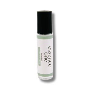 Clear glass rollerball bottle with a black cap labeled Morning Calm Rollerball - Anxiety Support | Essence One, designed for wellness and body care use.