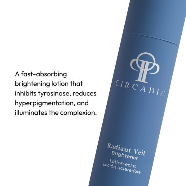 Close-up of a blue tube of Radiant Veil Brightener (formerly White Veil Brightener) | Circadia, a fast-absorbing skincare lotion that reduces hyperpigmentation and brightens the complexion.