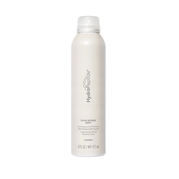 White spray bottle of Solar Defense Body SPF30 | HydroPeptide with minimalist branding, designed for skincare and body care protection.