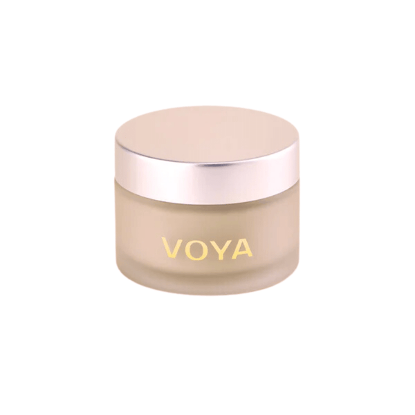 Jar of Get Glowing Illuminating Clay Mask | VOYA, a skincare product in a frosted container with a metallic lid, designed to enhance skin radiance.