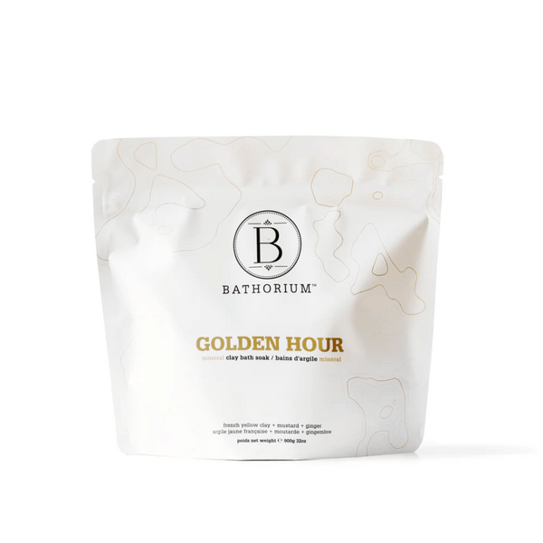 White resealable pouch of Golden Hour Clay Mineral Soak | Bathorium with minimalist design for skincare and body care wellness routines.