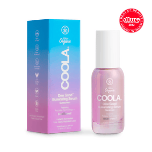 Bottle and packaging of Dew Good Illuminating Serum Probiotic Sunscreen SPF 30 | COOLA showing a pink and blue gradient design, highlighting skincare and sun protection.