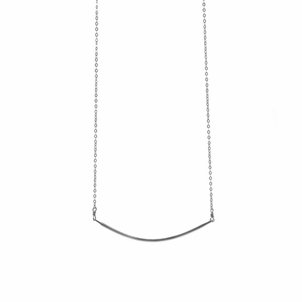 Rounded Bar Sterling Silver Necklace | Liv & B featuring a minimalist curved silver bar pendant on a delicate sterling silver chain, perfect for everyday elegance.