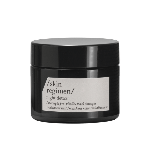 Black jar of Microalgae Essence | /skin regimen/ night detox overnight pro-vitality mask for skincare and rejuvenation displayed on white background.
