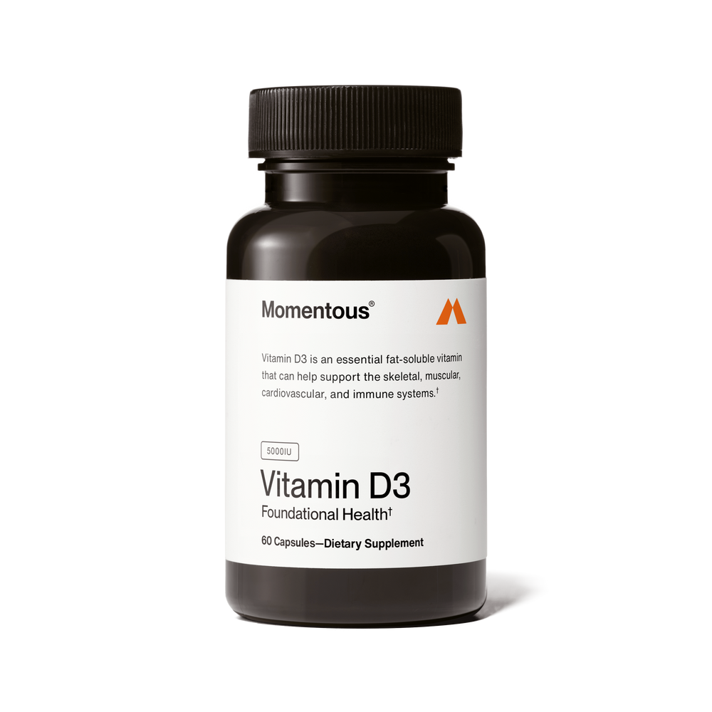 Bottle of Vitamin D3 5000 IU dietary supplement capsules supporting skeletal, muscular, cardiovascular, and immune health for overall wellness.