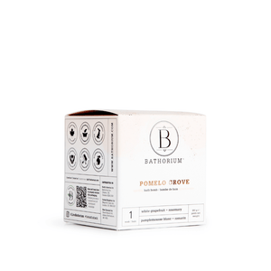 White and beige box packaging for Pomelo Grove Bath Bomb | Bathorium featuring natural skincare ingredients like white grapefruit and rosemary for a refreshing body care experience.