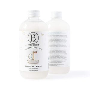 Clear plastic bottle of little charlie™ Bubble Bath Milk | Bathorium with white label featuring a simple boat illustration, designed for skincare and body care wellness.