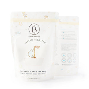 Packaging of little charlie™ Kids Bath Soak 750g | Bathorium featuring coconut and oat bath soak in a soft pastel design with playful illustrations for gentle skincare and wellness.