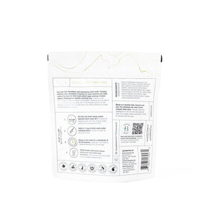 Back view of Coconut + Vanilla Milk Mineral Soak 650g | Bathorium packaging showing product instructions, ingredients, and wellness certifications for body care.