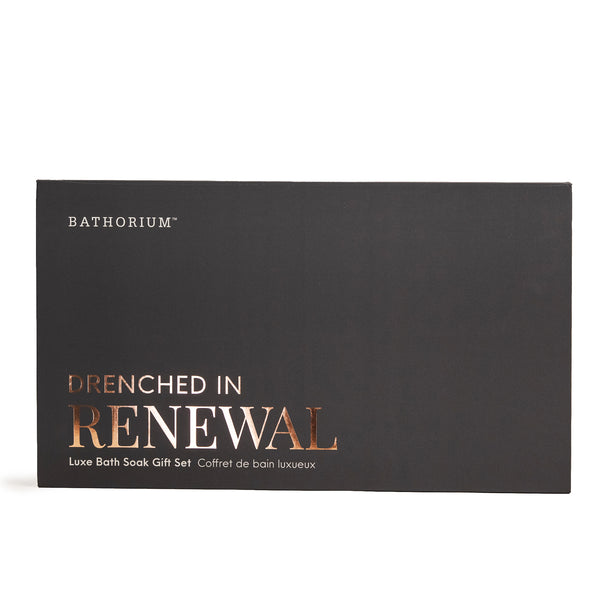 Elegant black gift box with rose gold lettering displaying Drenched In Renewal Gift Box Set | Bathorium, a luxury bath soak set for skincare and body care wellness.