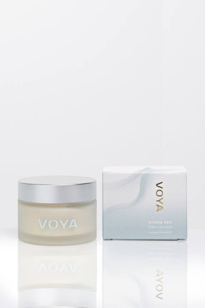 Clear frosted glass jar with silver lid and matching box packaging for Hydraveil Hydrating Face Mask | VOYA, designed for skincare and wellness.