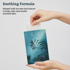 Hands holding a blue soothing skincare mask packet with tea tree leaf design, highlighting the calming and soothing benefits of Leaders Skin Renewal Mask Teatree Relaxing | Leaders.