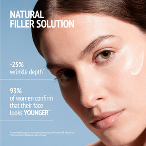 Close-up of a woman with smooth skin applying a clear serum to her cheek, promoting skincare benefits with Sublime Skin Intensive Serum | [ comfort zone ] for wrinkle reduction and youthful appearance.