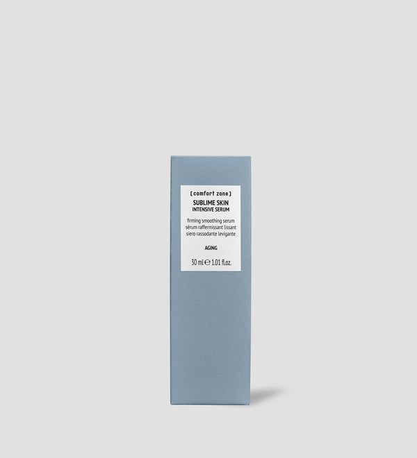 Blue rectangular box packaging of Sublime Skin Intensive Serum | [ comfort zone ] with white label detailing firming smoothing serum for aging skin, 30 ml size, against a plain light gray background.