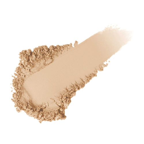 Swatch of nude powder texture illustrating Powder-Me SPF Sunscreen SPF 30 | Jane Iredale for skincare protection and sun defense.