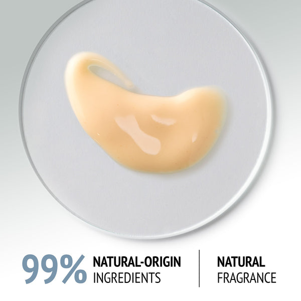 Close-up of a smooth, light beige serum texture on a clear surface highlighting natural-origin ingredients for Sublime Skin Intensive Serum | [ comfort zone ].
