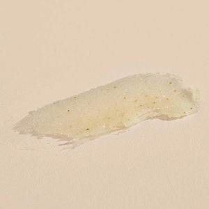 Close-up texture of a gentle body polish with natural exfoliating particles, highlighting Jasmine Tuberose BODY POLISH | Sparitual for skincare and body care wellness.