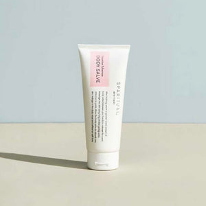 Tube of Jasmine Tuberose BODY SALVE | Sparitual standing on a flat surface with soft natural lighting, showcasing minimalist packaging for skincare and body care.