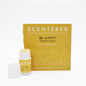 Be Happy Mini Aromatherapy Balm | Scentered in a yellow tube with white cap beside matching yellow box, designed for skincare and mood-boosting wellness.